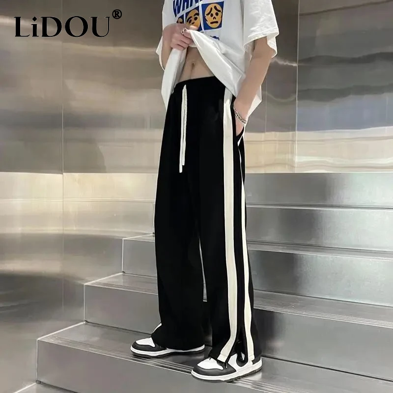 

Summer New Elastic Waist Drawstring Pockets Contrast Color Patchwork Split Wide Leg Trousers 2023 Man Street Motion Trousers