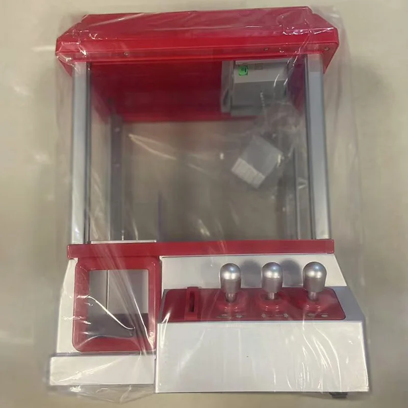 

Kids Doll Claw Machine Small Household Coin Play House Toys Clip Doll Machine Mini Candy Game Machine