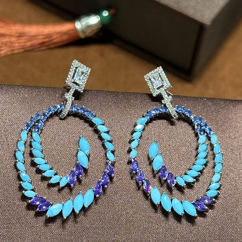

Geometric Rotating Back-shaped Diamond-inlaid Zircon Water Drop Earrings 2025
