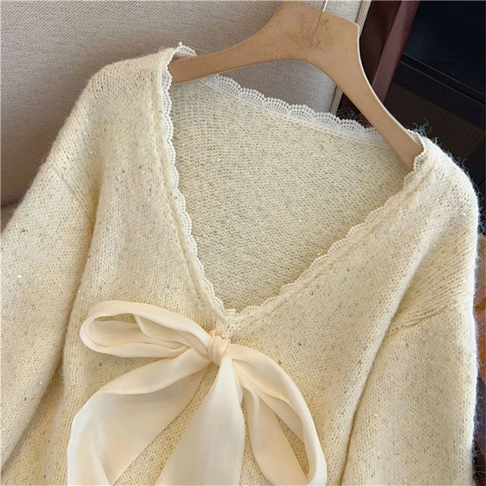 Maglione da donna di media lunghezza autunno inverno top eleganti pullover da donna moda francese fiocco in pizzo impiombato maglione con scollo a V