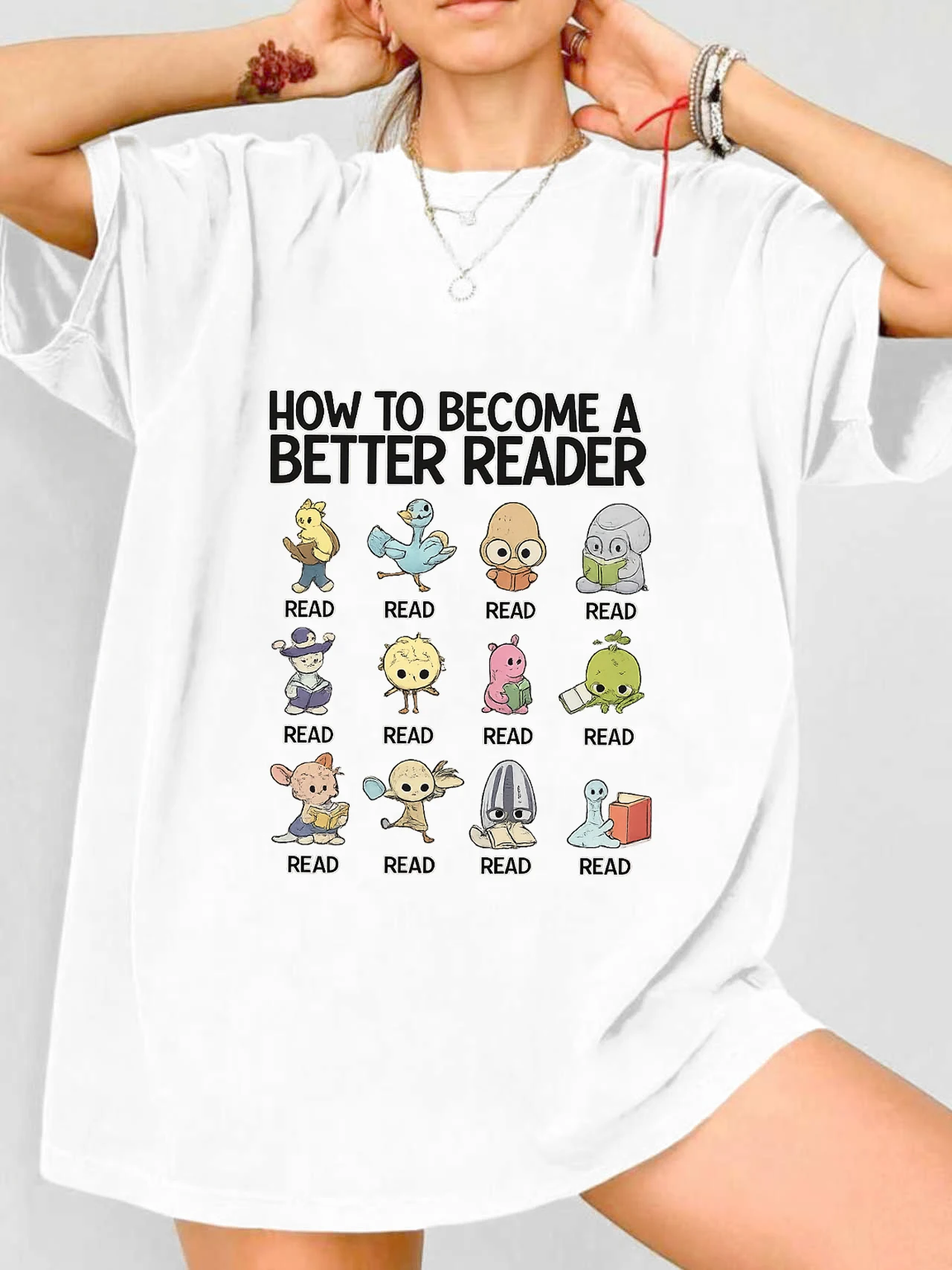 

【WDS03190】Женская футболка больших размеров с круглым вырезом и принтом в виде мультяшных рисунков и букв, летняя, повседневная, с короткими рукавами, модная, универсальная.