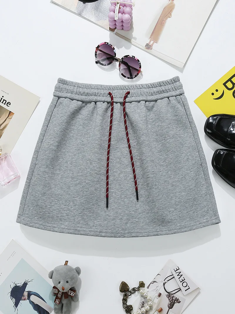 تنورة قصيرة غير رسمية برباط على الموضة للسيدات لصيف 2026 سترة كورية جديدة عالية الخصر من القطن تنورة رياضية على شكل حرف A