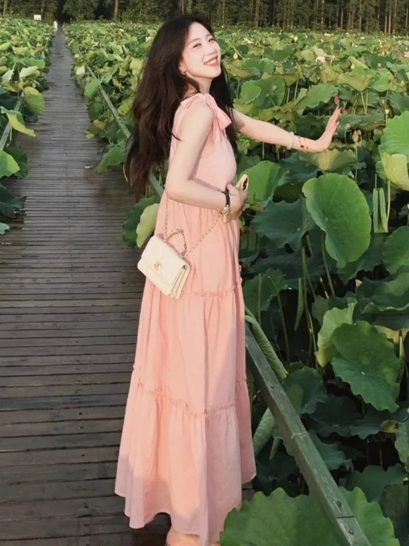 Vestido largo de playa sin mangas 2025 verano rosa francés dulce lindo pequeño fresco correa vestido de vacaciones en la playa w127