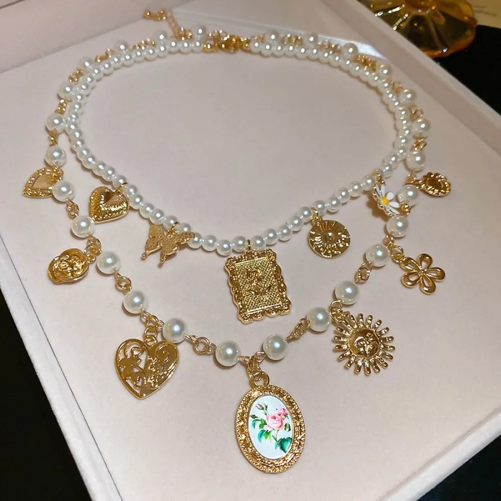 

2Pcs/Set New Butterfly Flower Pendant Necklace Heart Pearl Clavicle Choker 2 Layers Sunflower Pearl Chain Necklaces Women