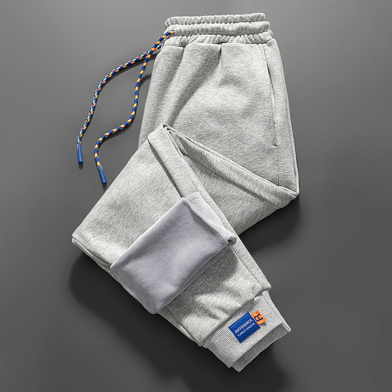 가을과 겨울 야외 남성 캐주얼 다용도 드로스트링 플리스 스포츠 팬츠 패셔너블 루즈 편안한 발목 묶음 팬츠