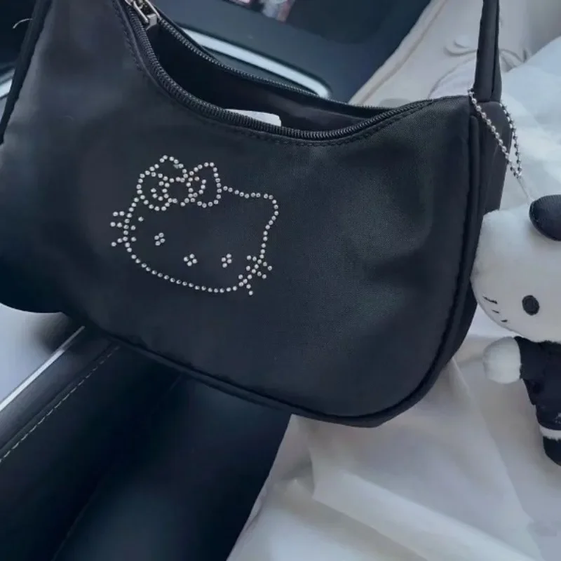 MBTI-Bolsos de mano con estampado de Hello Kitty para mujer, bolso Vintage informal negro a la moda con cremalleras de nailon, bolso de hombro