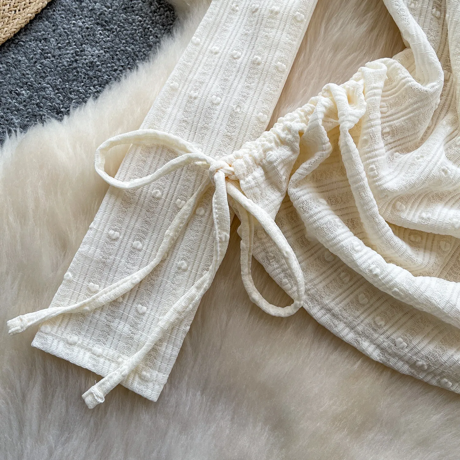 2026年春 韓国風 ルーズ レースアップ プルオーバー ウエストシェイプ フェイクツーピース トップス レディース ボウレース スプライシング 長袖トップス