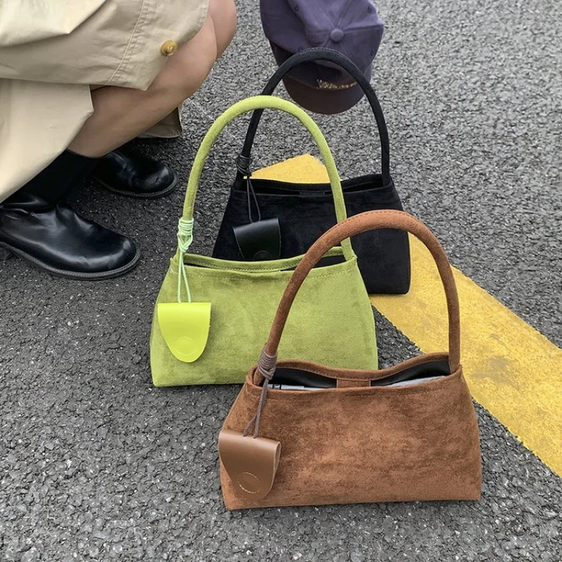 

High-End Minimalist Leather Clutch Mini Bag For Women With Trendy Letter Logo And Vintage Fashion Style