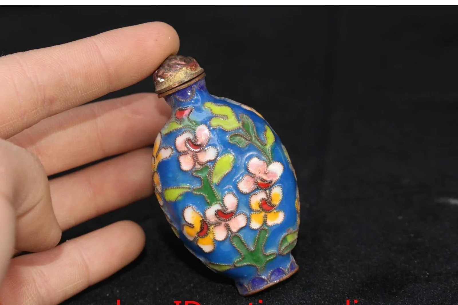 

A Chinese Collectible Bronze Filigree Plum Blossom Snuff Bottle