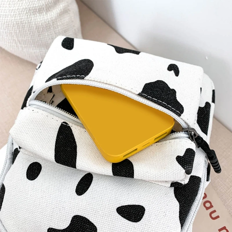 E74B Mini Canvas Daypack with Plush Pendant Cow Print Backpack for Women Lady Girls Outdoor Travel Shopping Shoulder Bag Bookbag