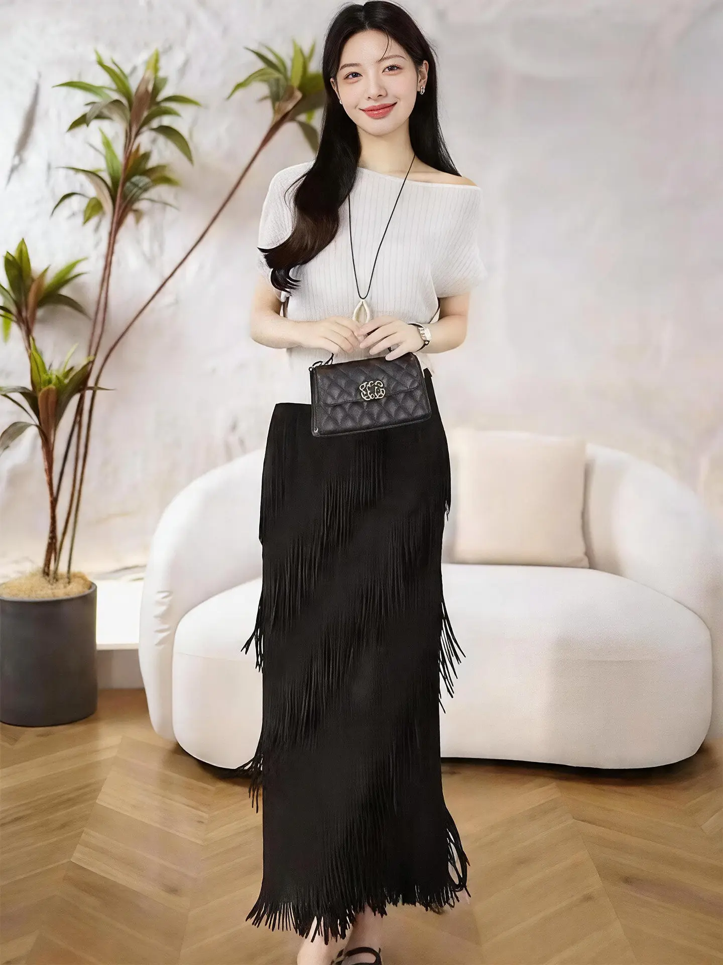 

Black Tassel Half-length Skirt Women's High-waist Slimming Midi Fashion Pleated Design Sense Skirts Asymmetric Loose Type