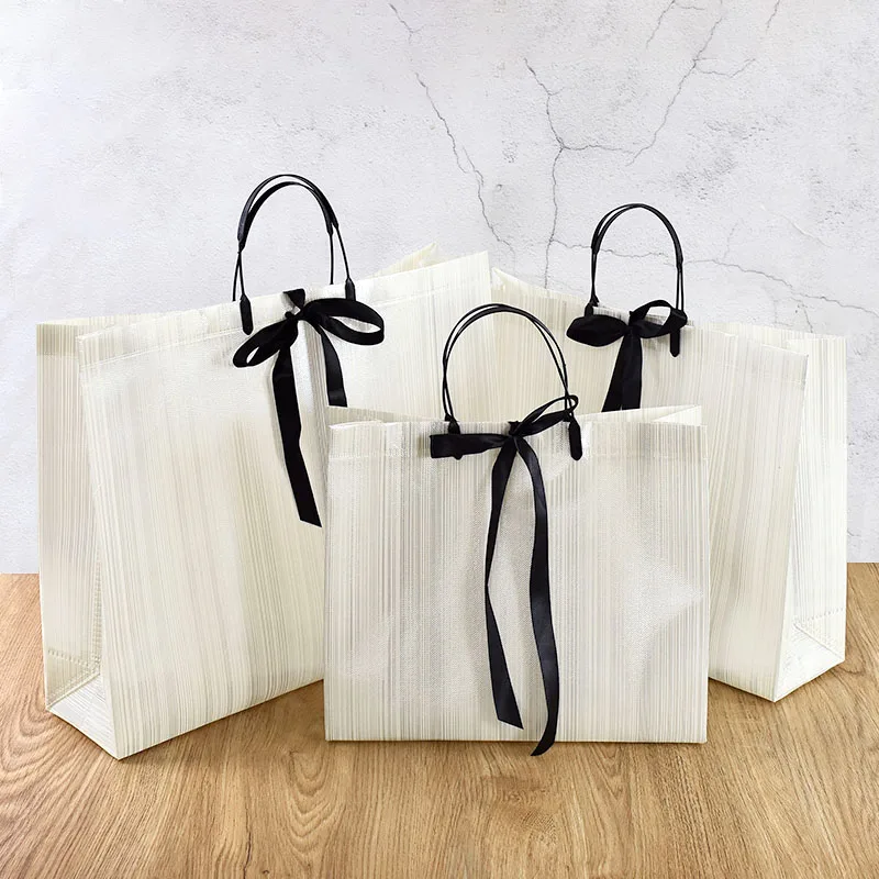 1pc Gift Packaging White Non-woven Bag With Black Border Shopping Bags Portable Tote Bags Bow Ribbon Dinner Party Supplies