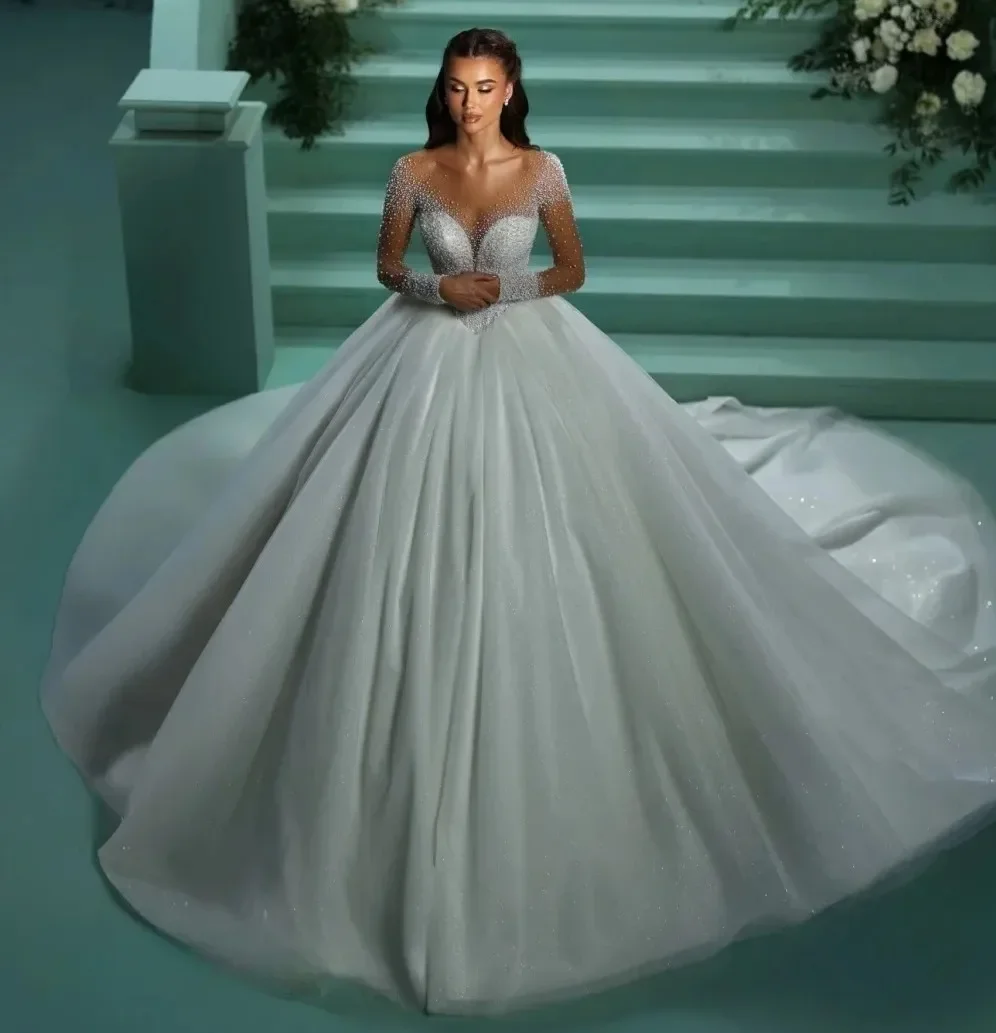

New Church Wedding Dress 2025 Sheer Neck Heavy Pearls Long Illusion Sleeves Bride Bridal Gowns Arabic Dubai Vestidos De Noiva