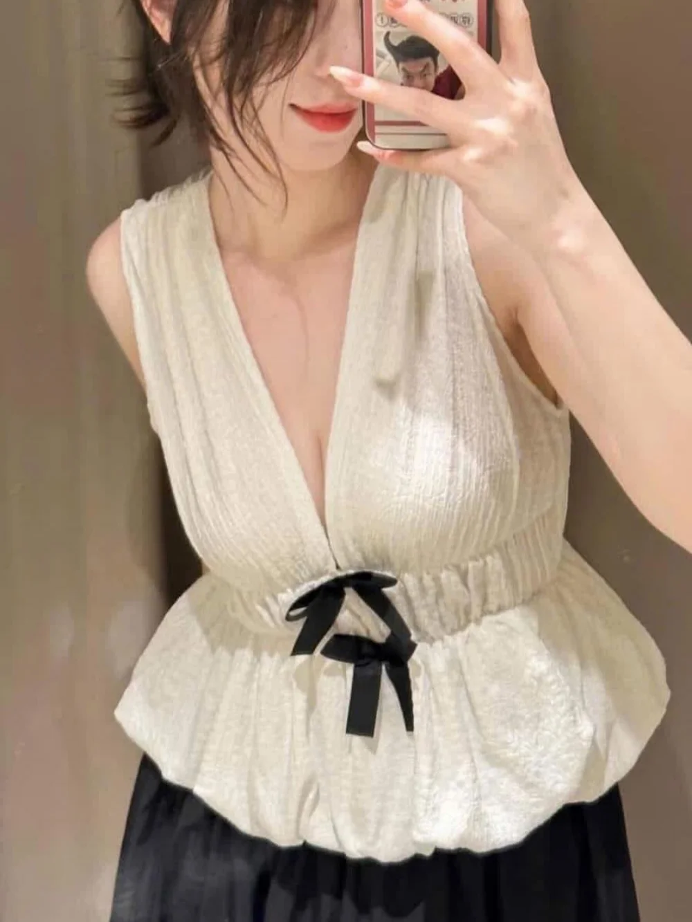 Autunno da donna nuovo semplice scollo a V profondo bordo con fiocco strutturato casual top slim pendolarismo elegante top corto senza maniche in vita elastica