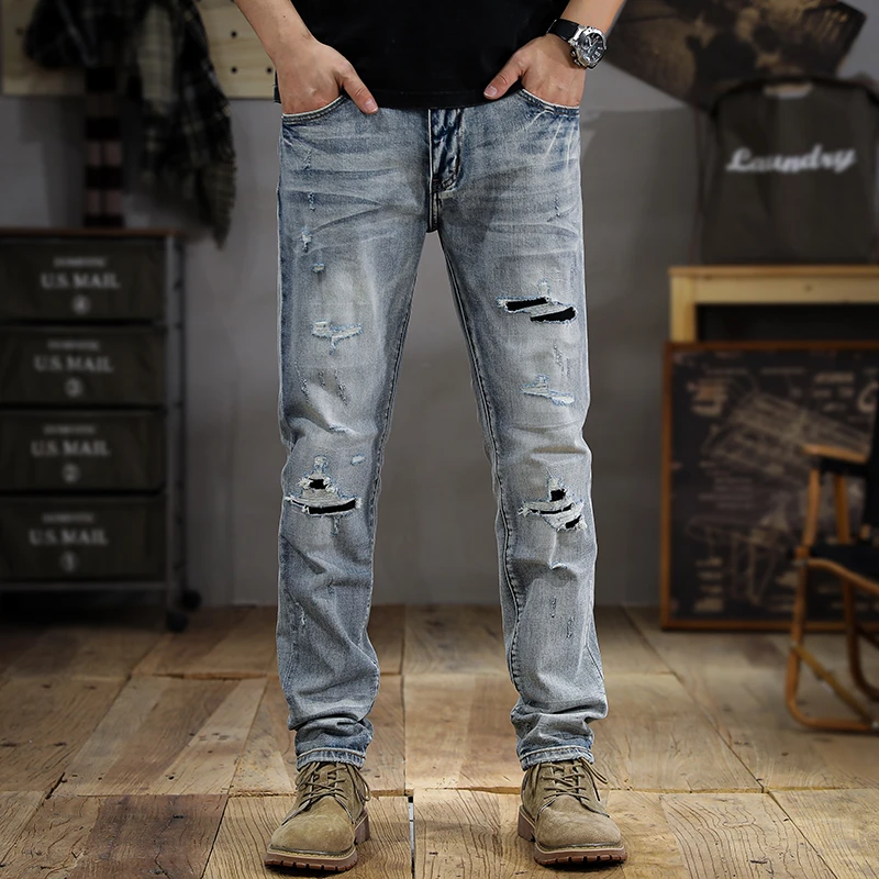 Abbigliamento lavato di marca di moda estiva-Jeans strappati bianchi pantaloni dritti Slim-Fit in stile coreano alla moda da uomo pantaloni nastrati da mendicante