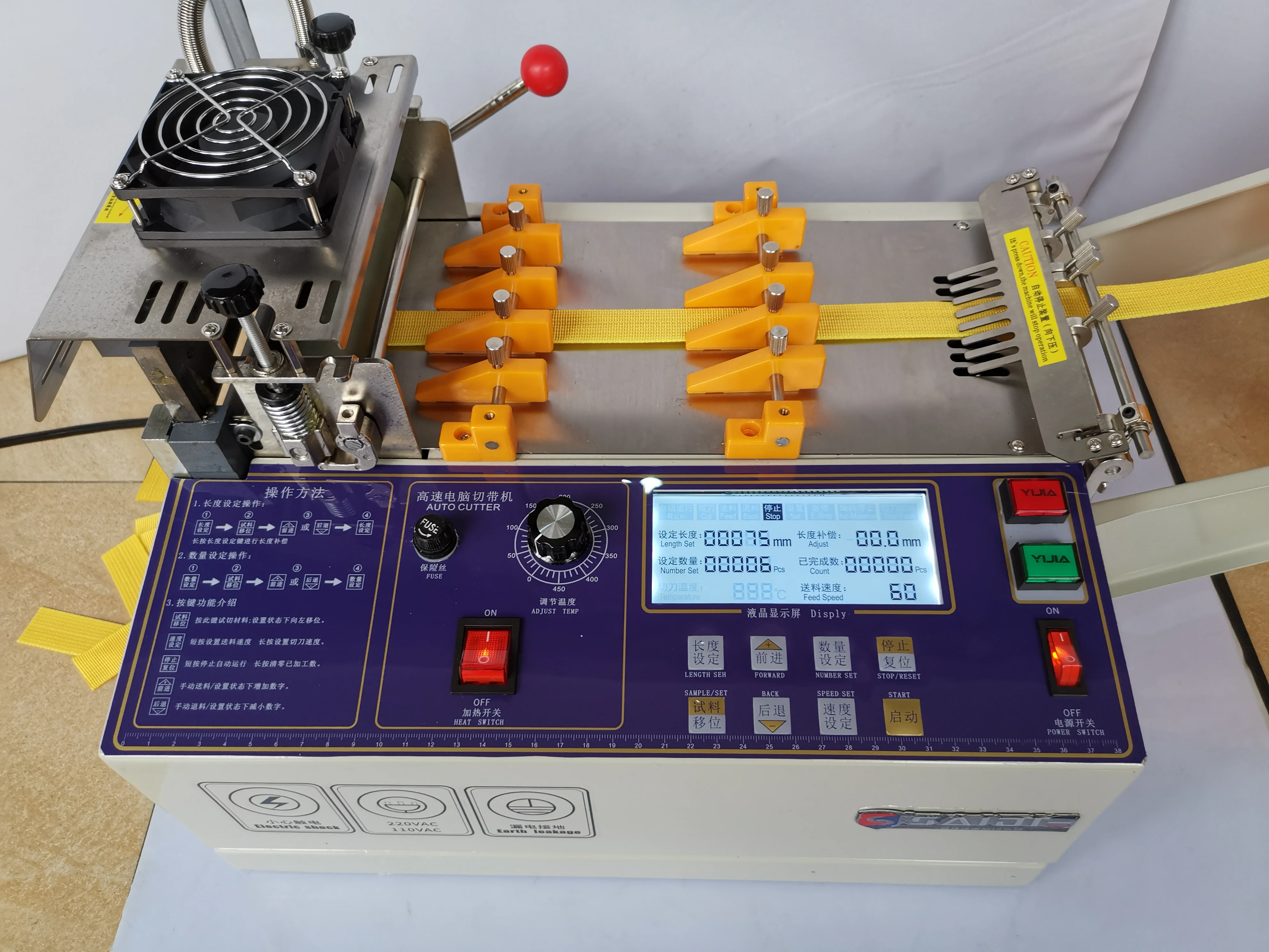 

Computer automatic hot and cold Cloth tape cutting machine 140T ,magic adhesive tape zipper webbing elastic belt cutter