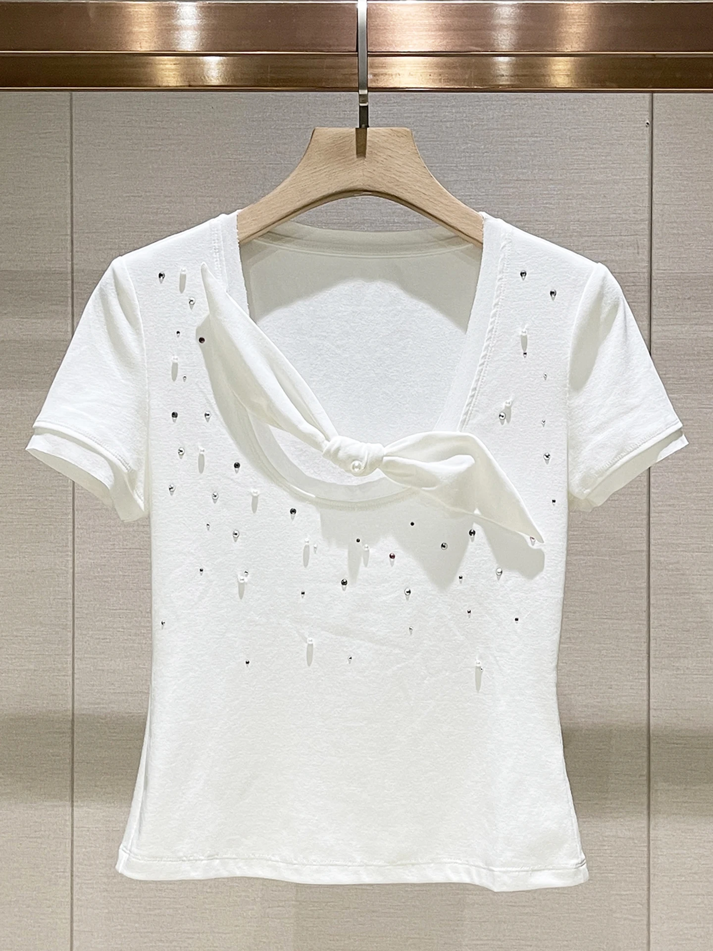 

Spring 2026 Women's Slim Fit Short Sleeve T-Shirt round Neck Knot Design Casual Comfortable Knitted White Top