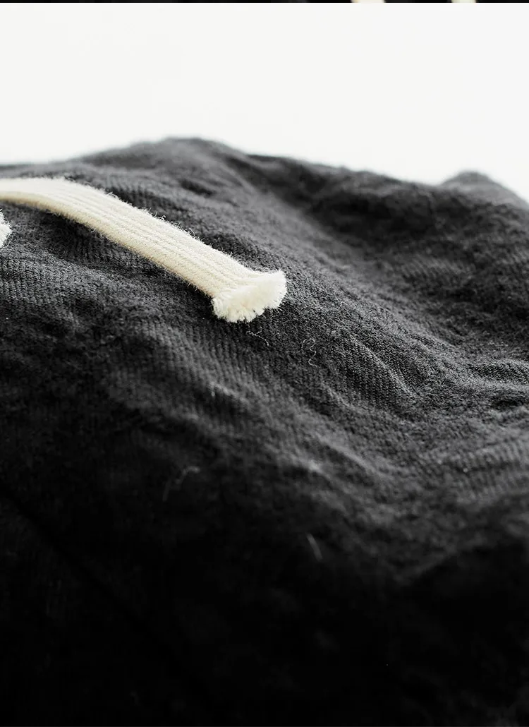 Falda de paraguas versátil ~ Tela Jacquard de lana 100% Otoño e Invierno Nuevo producto 2025 Media falda Falda negra Falda de capullo de flor alargadora de piernas para mujer