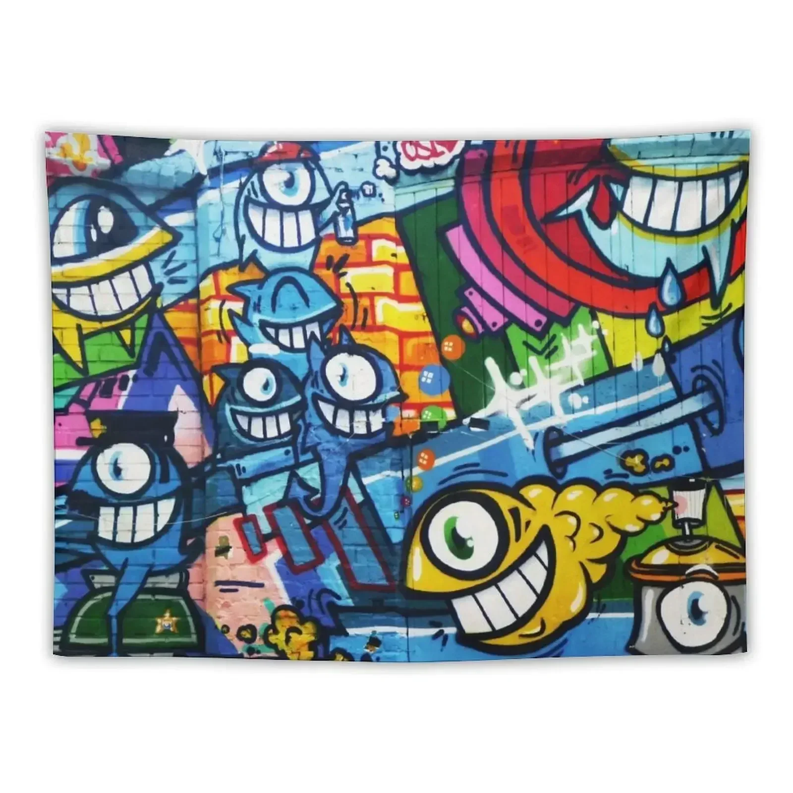 Graffiti Urban colorful graffiti city wall comical cartoon fishes with big eyes doing graffitis Tapestry