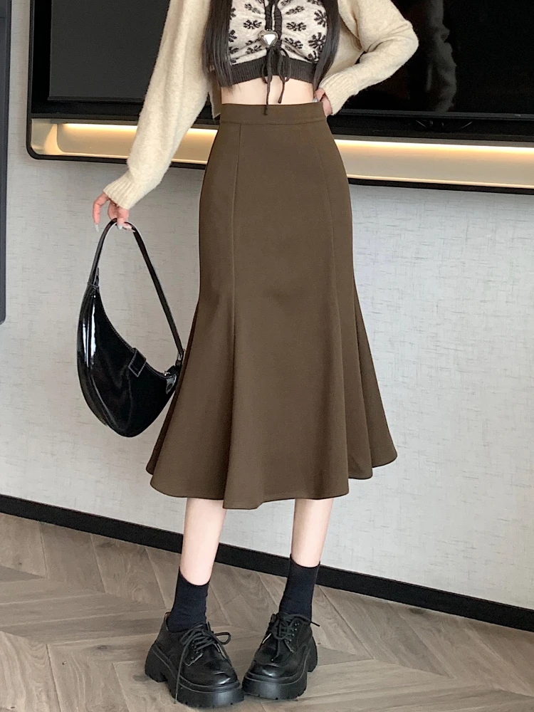 

Woolen fishtail half body skirt women's autumn and winter 2025 new high waist slimming A-line commute mid length skirt