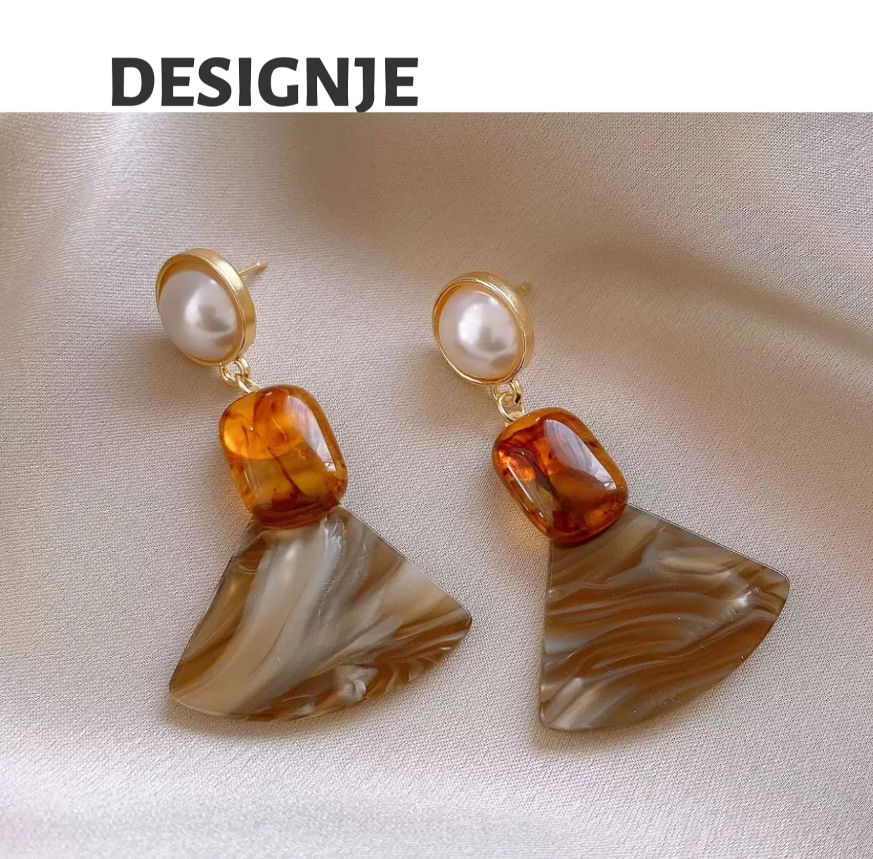 

Hot-selling high-end new retro tiger eye temperament geometric earrings French fashionable luxurious design sense new trendy ear