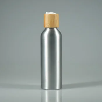 

Cosmetic package silver bamboo essential oil body lotion aluminum bottle with disk top cap spray cap，hotal portable lotionbottle