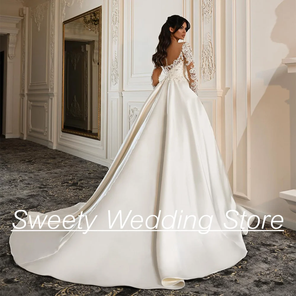 Sexy Wedding Dress Illusion Long Sleeve Round Neck Beading Applique Stone Corset Bridal Gown Sweep Train Satin Bride Dresses