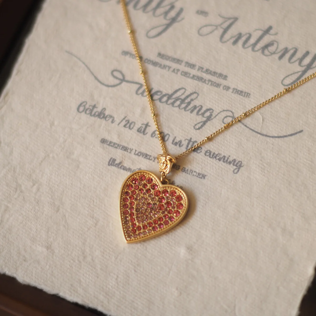 

Artisan-Crafted Niche Necklace - Pink Heart Crystal Pendant, Medusa-Mythology Gold-Tone Sweater Chain