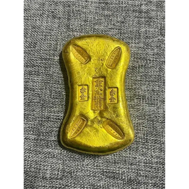 Collection of ancient coins and old objects made in Kangxi year with a solid gilded gold nugget of five taels of red gold
