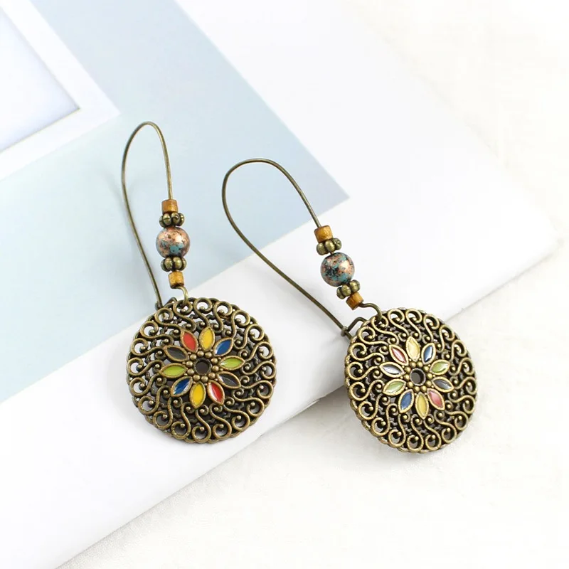 

Retro ethnic style pendant, ear jewelry for women, new metal fashion personality hollow multicolored sunflower earrings