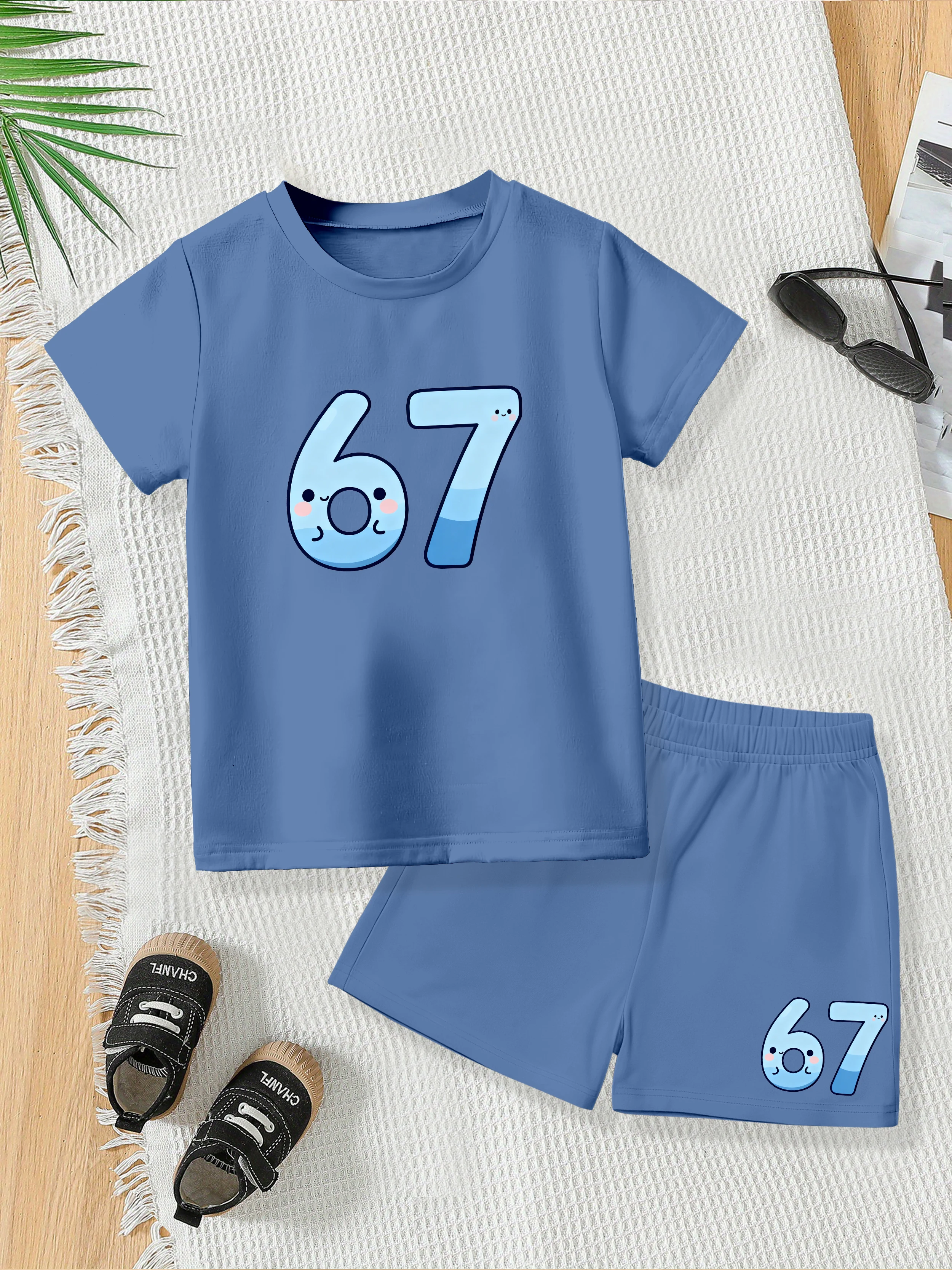 

2 предмета: летняя футболка и шорты для мальчиков, синий принт с мультяшным рисунком, номер 67