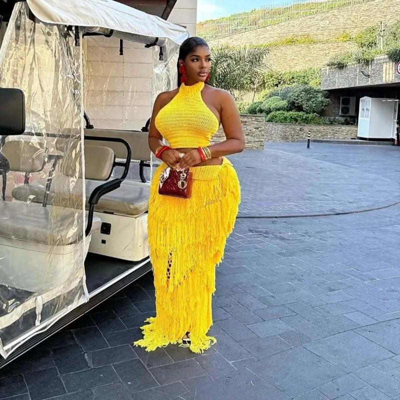 

Vacation Beach Knitted 2 Piece Set Women Solid Lace Up Halter Backless Tank Crop Tops + Hollow Tassel Bodycon Maxi Skirts Suits
