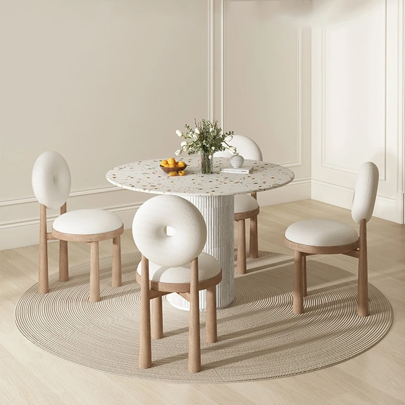 

Feng Shui grinding stone round dining table and chair combination modern simple small apartment rock slab solid wood dining