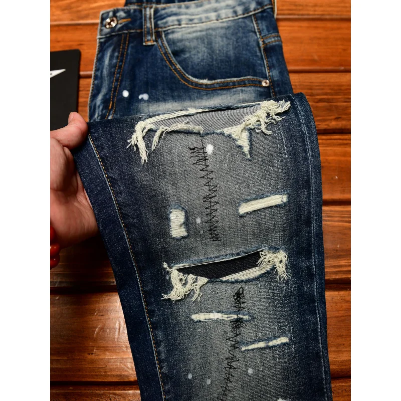 High end nostalgic jeans for men, slim fit with small holes, patches scraped, inkjet street trend, elastic retro denim pants view 5