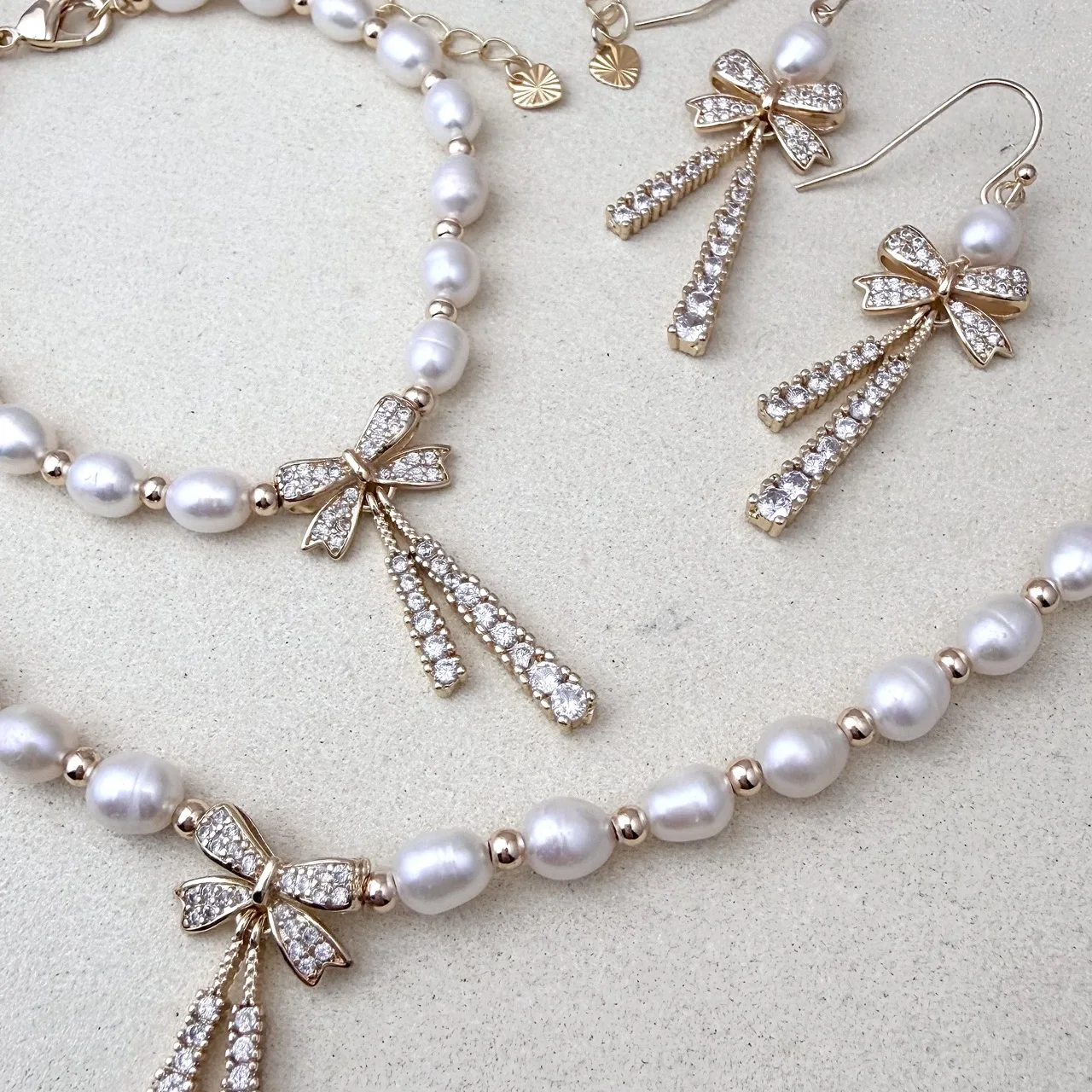 Natural Rice-Shaped Pearl Bowknot Necklace Bracelet Earrings Set Light Luxury Minimalist High-End Temperament Versatile Jewelry view 5