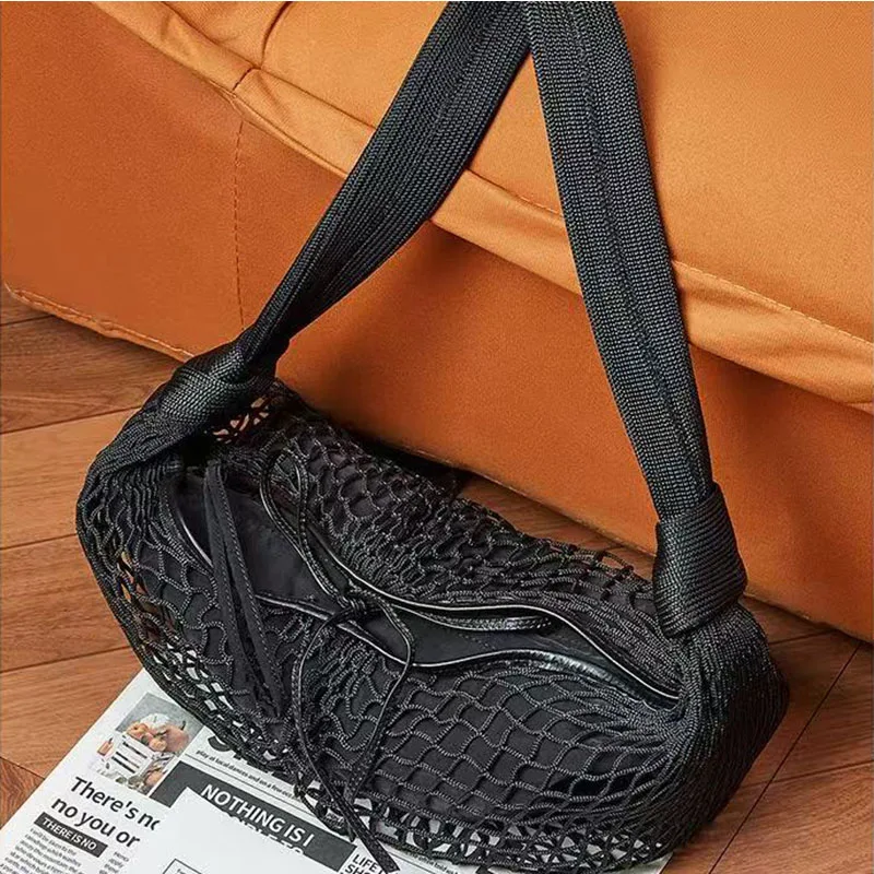 2026 new woven hollow out women's crossbody bag fashionable and versatile contrasting color cow horn mesh bag
