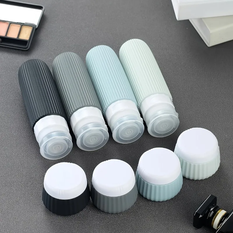 8 個詰め替えトラベルボトルセットポータブルシリコーントイレタリー容器漏れ防止化粧品スクイズボトルクリーム保存瓶