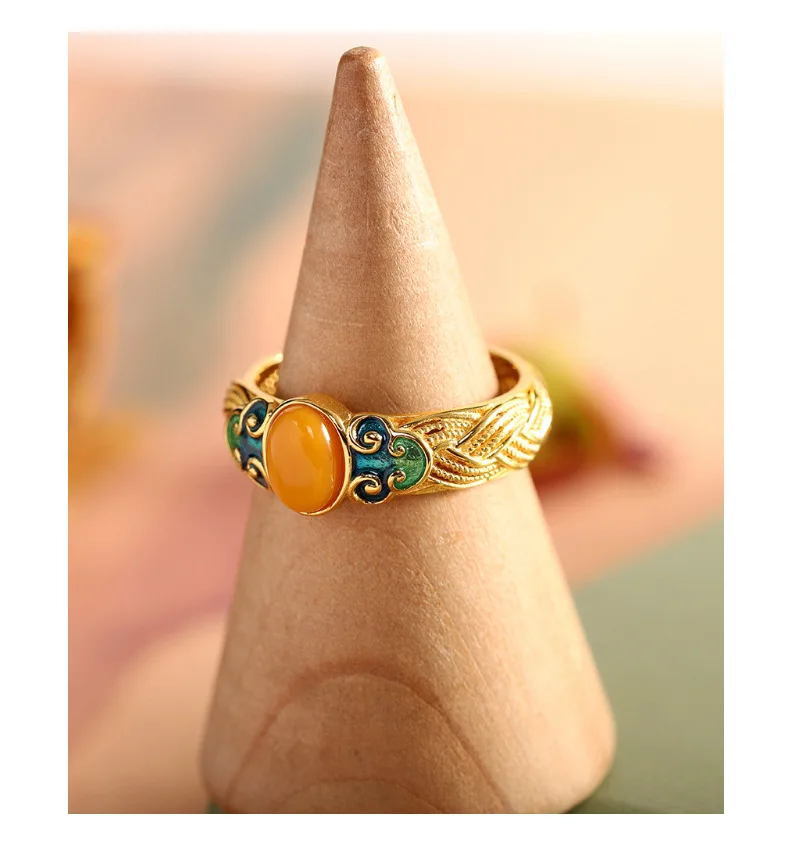 s925 sterling silver gold plated ring with beeswax embellish burning blue clouds