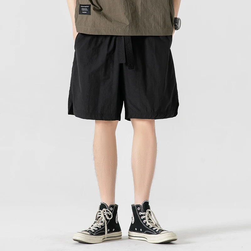 Sommer dünne Modetrend lässige Shorts Herren solide elastische Taille Kordel zug Patchwork Taschen koreanische vielseitige gerade Shorts