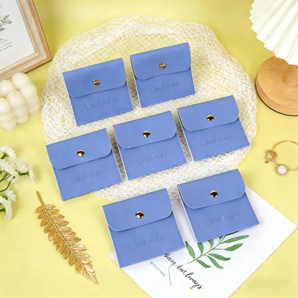 

Портативная пылезащитная сумка из искусственной кожи на кнопках для хранения ювелирных изделий, часов, очков, колец, с напечатанным логотипом, для ожерелий и серег