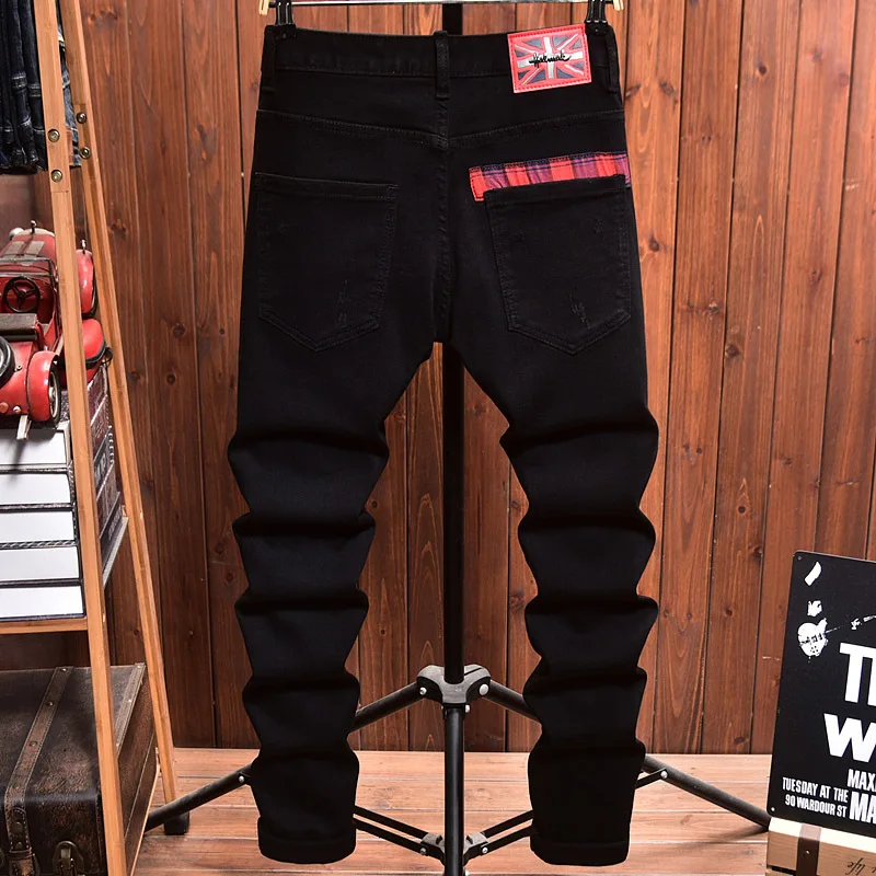 Jeans Ripped Pria dengan Desain Tambal Sulam Slim Fit Skinny Spring Trendy Street Motorcycle Style Celana Panjang Hitam