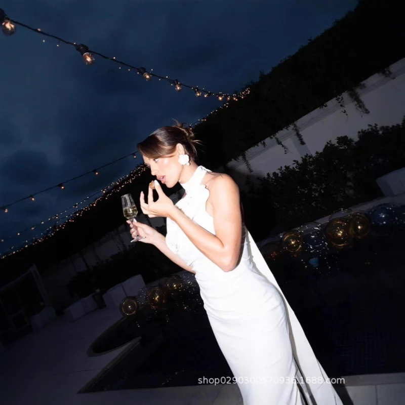 

2025 Hot Style Autumn New Elegant White Halter Neck Backless Slit Dress Long Dress Gown