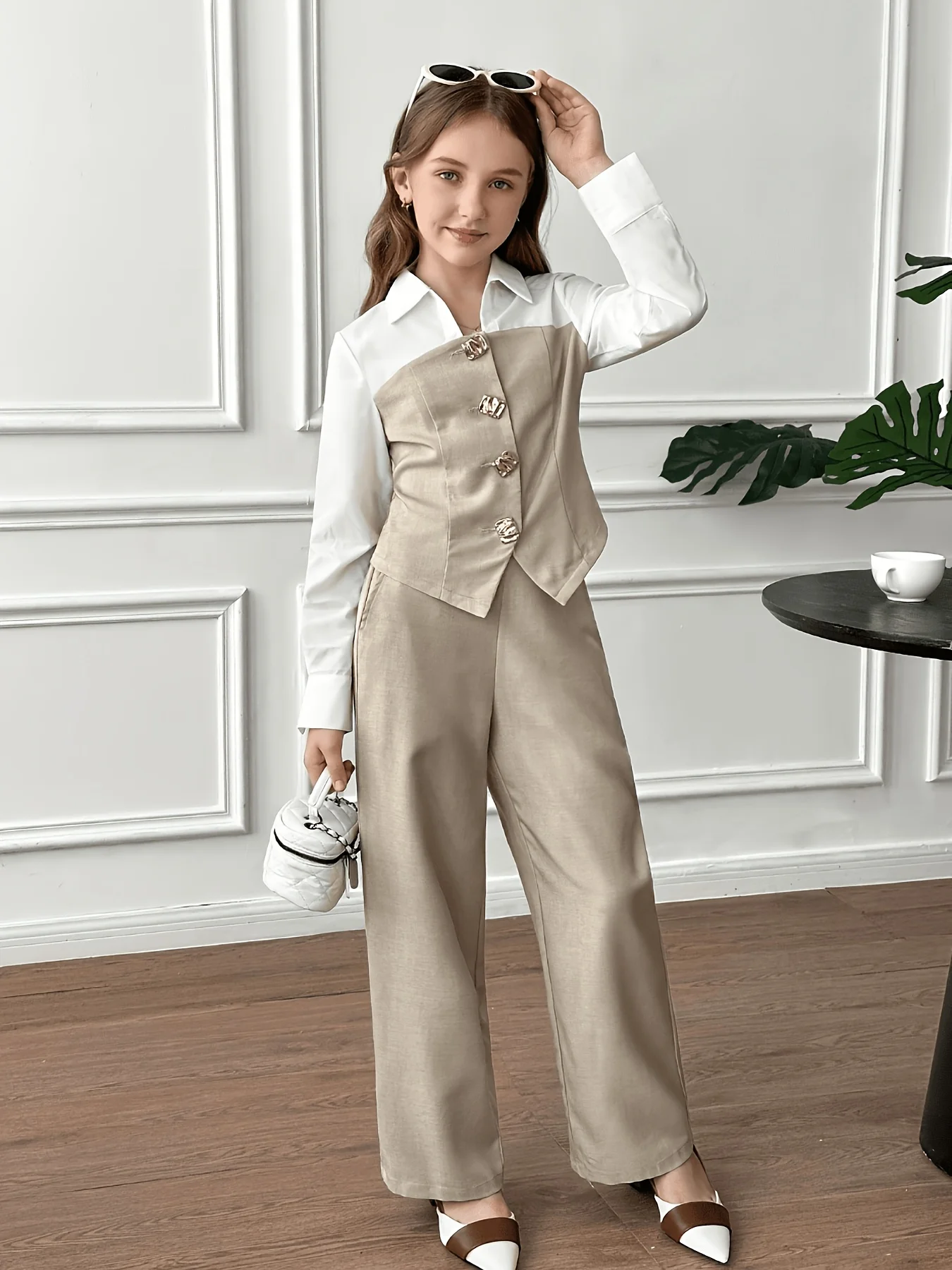 Girls' autumn and winter fashion casual outfit features a color-blocked, collared, long-sleeved top paired with matching casual pants, offering a high-end design and is suitable for everyday wear for children aged 7-13