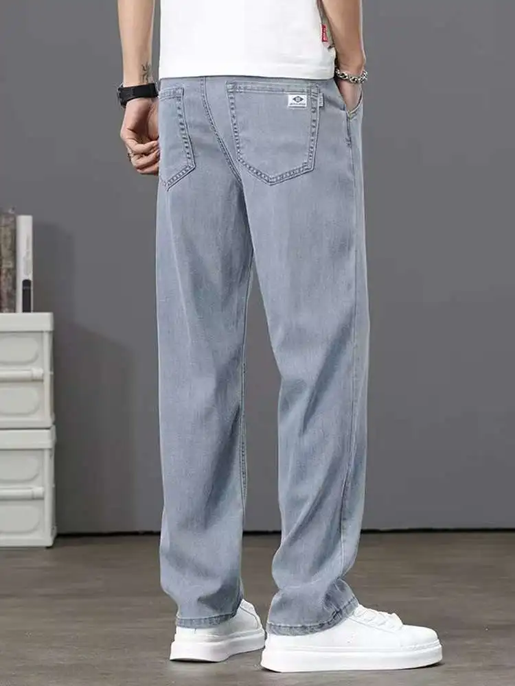 

New 2025 Men's Rigid Ice Silk Jeans Ultra-Thin Loose Straight Casual Elastic Long Trousers Summer Faion High-End Lenzing Denim
