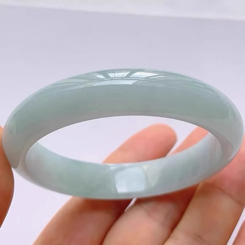 Myanmar ice waxy jadeite , single-color, from an old mine, green inclusions, round bracelet for women, with a moist