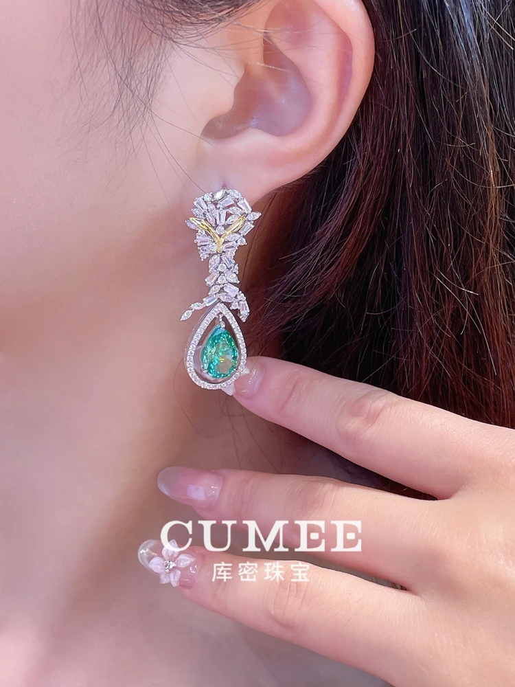 CUMEE الأزياء الأوروبية والأمريكية قطرات الماء الاصطناعية Paraiba الأخضر الأقراط النساء. الذهب المطلي بالفضة
