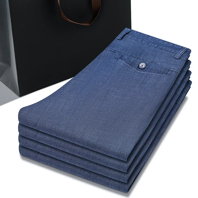 2024 nuevos pantalones vaqueros sueltos de tela fina de Lyocell para hombres pantalones vaqueros elásticos de moda de negocios azul claro ropa masculina pantalones de marca