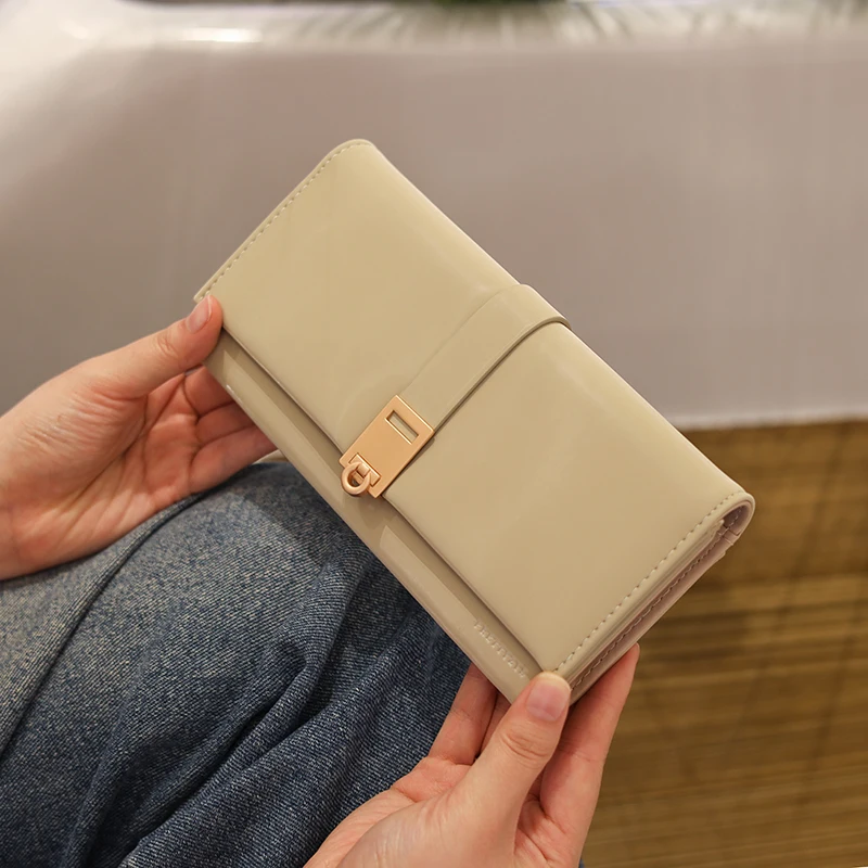 Autumn and Winter New Wallet Women's Long South Korea and South Korea Small Fresh PU Leather Solid Color Three Fold Bag Simple S