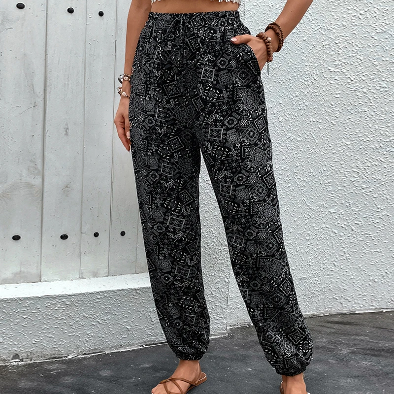 

Benuynffy Ethnic style Printed Bohemian Pants For Women Summer Knot Front Elastic Waist Pockets Casual Vacation Loose Trousers