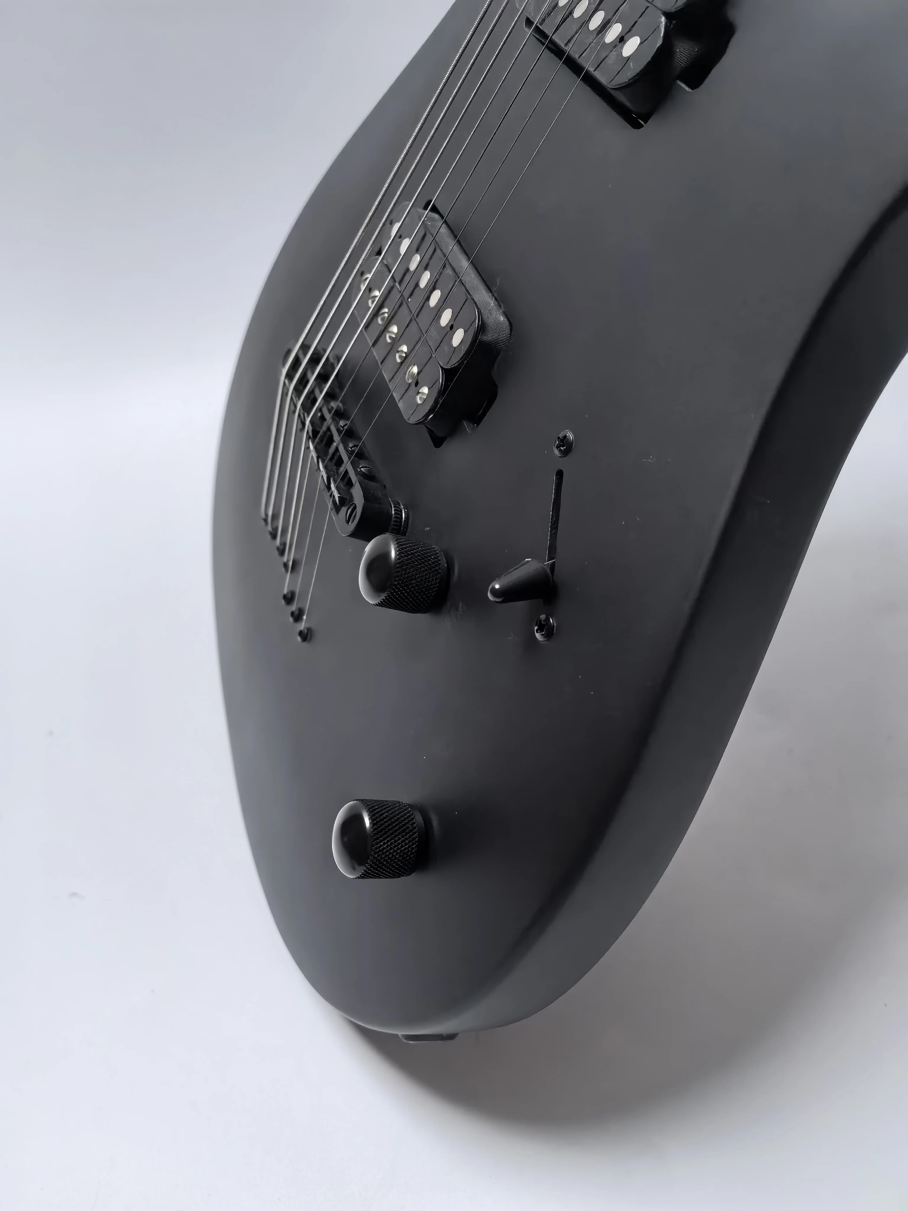 Matte Black 7-String Electric Guitar Mahogany Body Canadian Maple Fingerboard String-Through in Stock